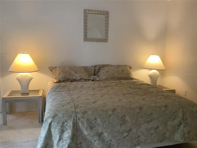 Primary bedroom - two walls can fit a king size accommodate a king size bed with 2 bed tables