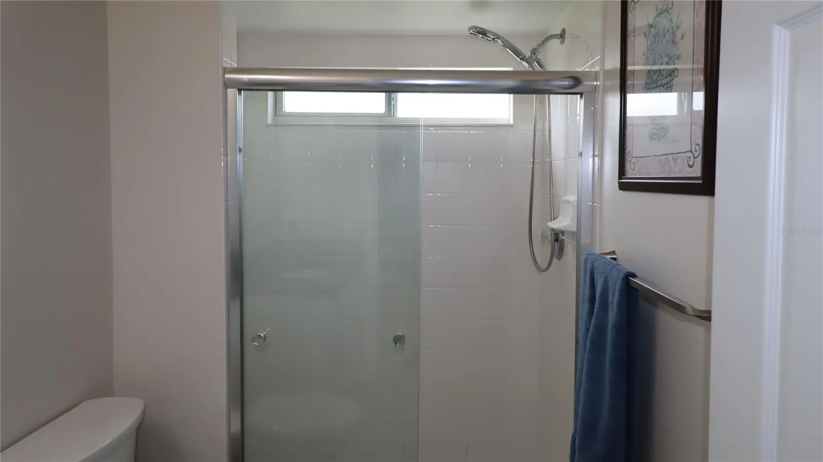 next to hall bath...