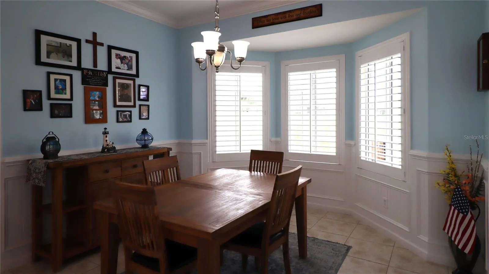 located just off dining with bay windows...