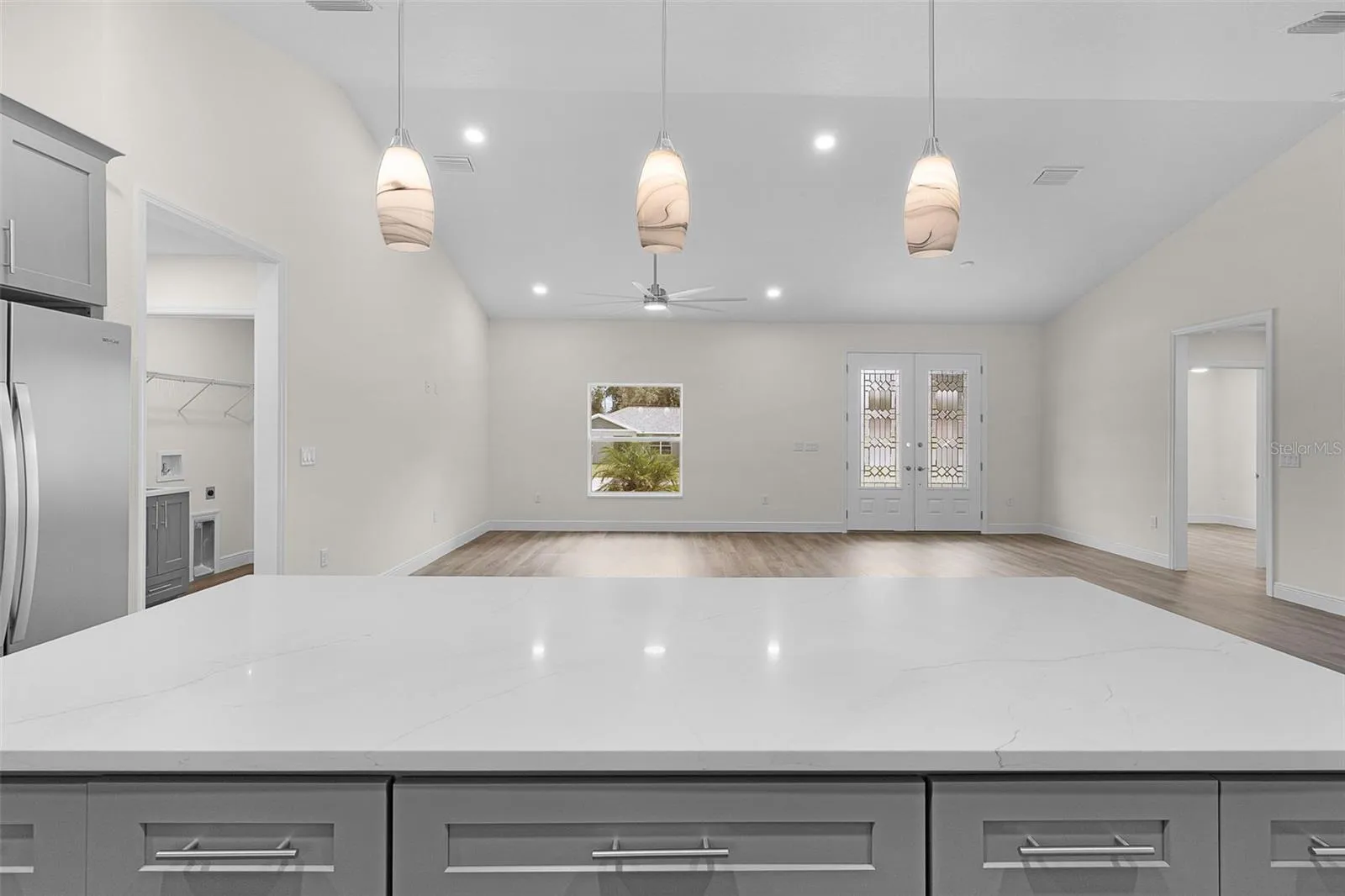 Beautiful Pendant lighting on your large kitchen island