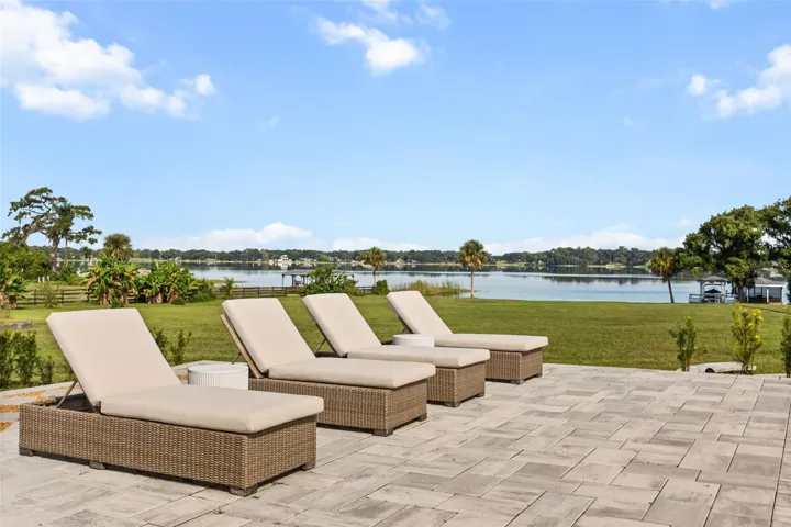 Lounging by pool with Lake Ola in view