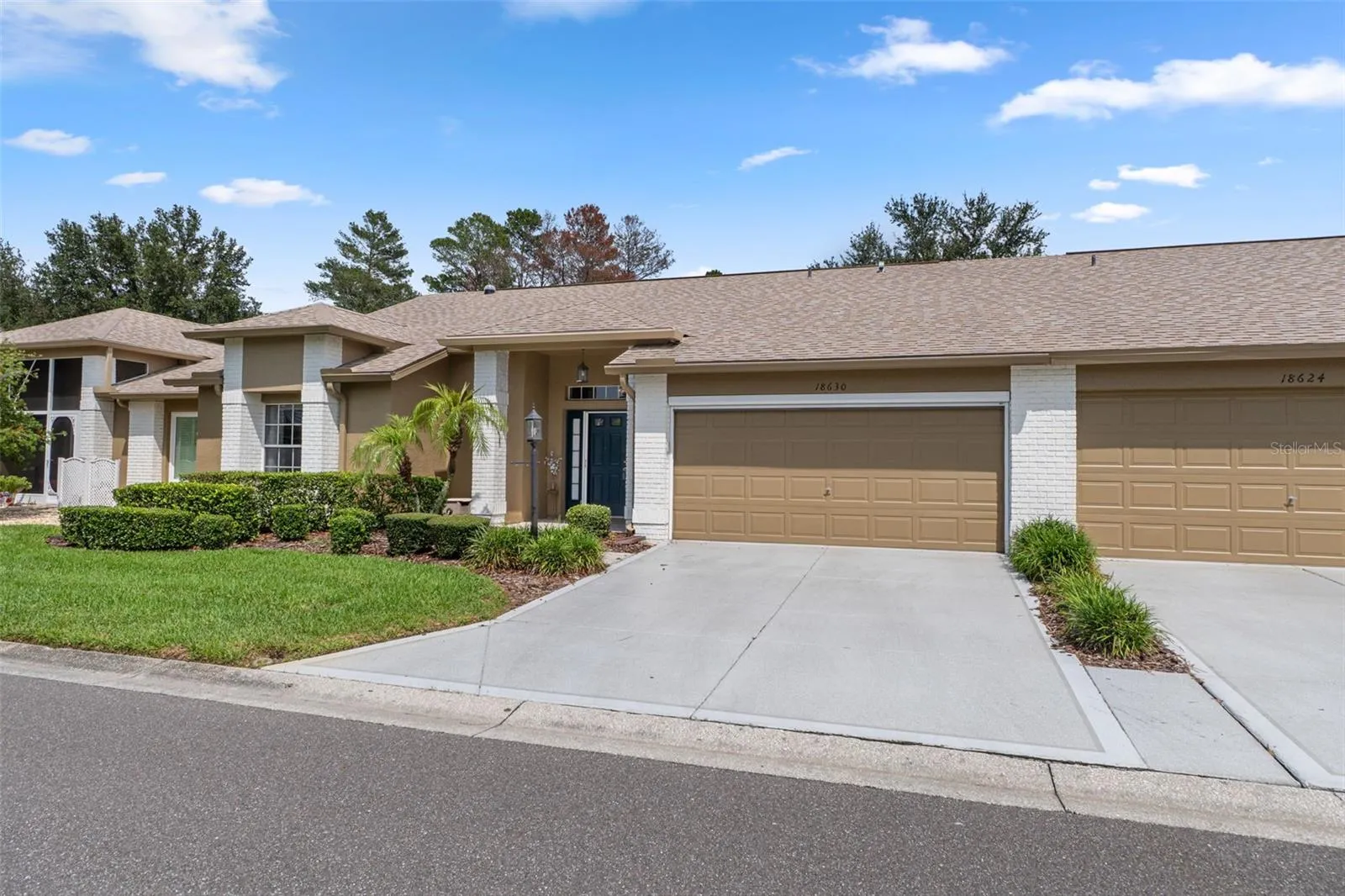Garage is on the left and Driveway