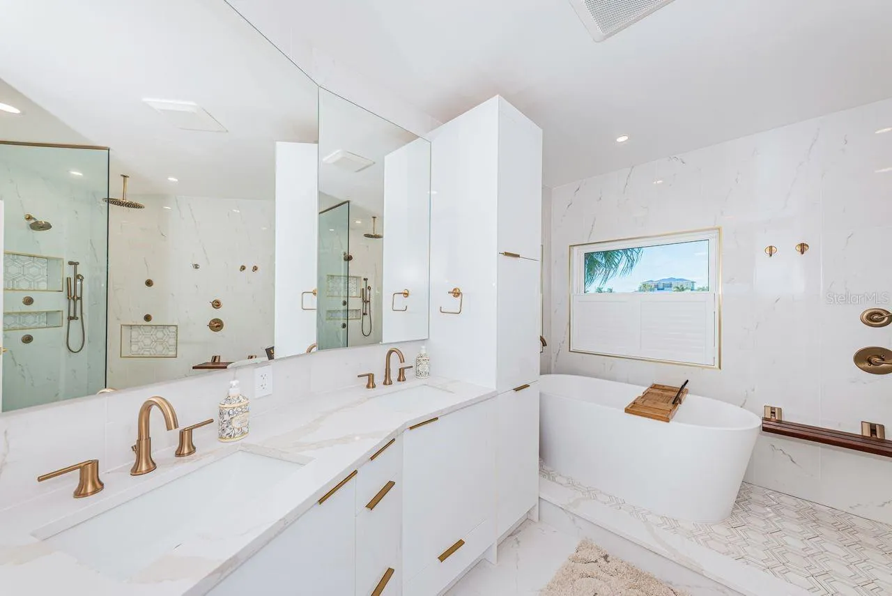 Deep bath tub and dual sinks
