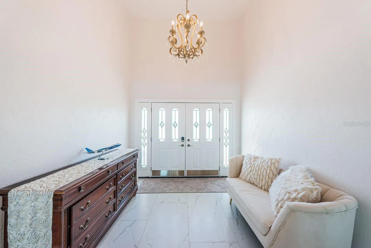 Foyer entry with vaulted ceiling