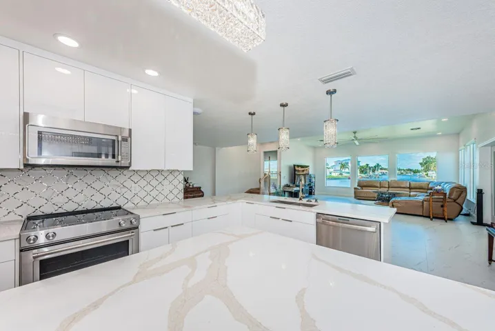 Lots of counter space with beautiful toe kick lighting and modern remote-controlled lighting