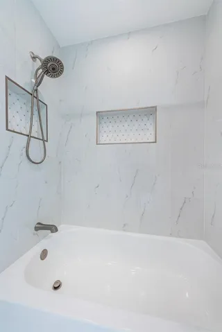 Gorgeous shower and bath option