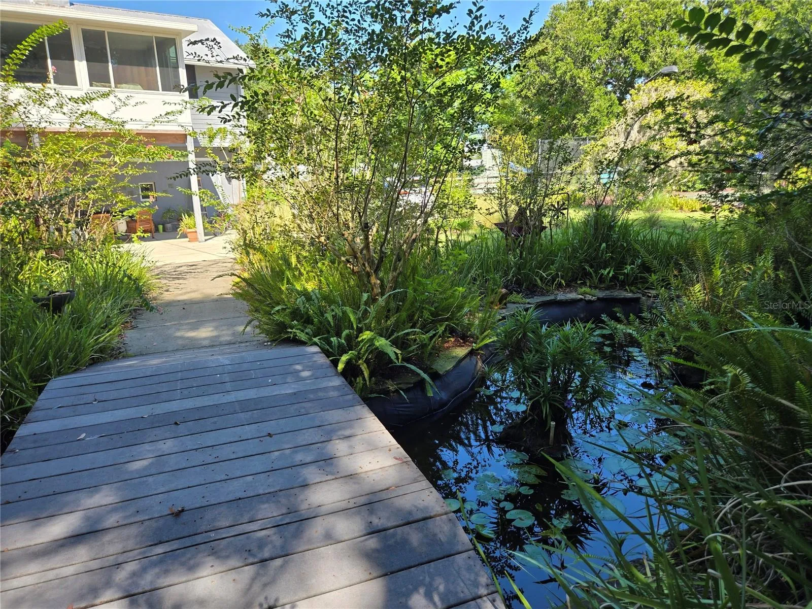 Bridge over pond to Garden