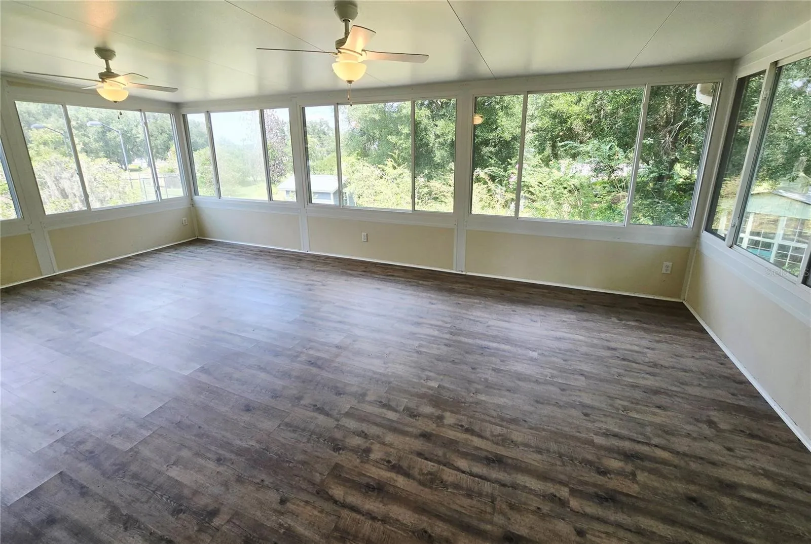 FL Sunroom overlooks garden &amp; sports court!