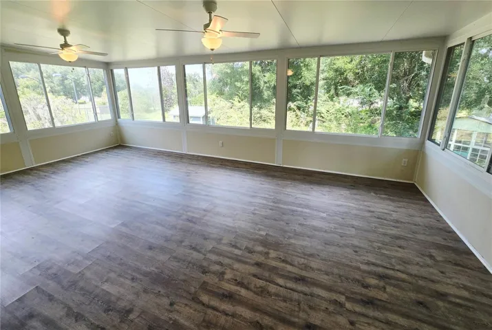 FL Sunroom overlooks garden &amp; sports court!