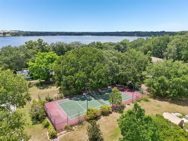 Regulation sports court is lighted &amp; fenced