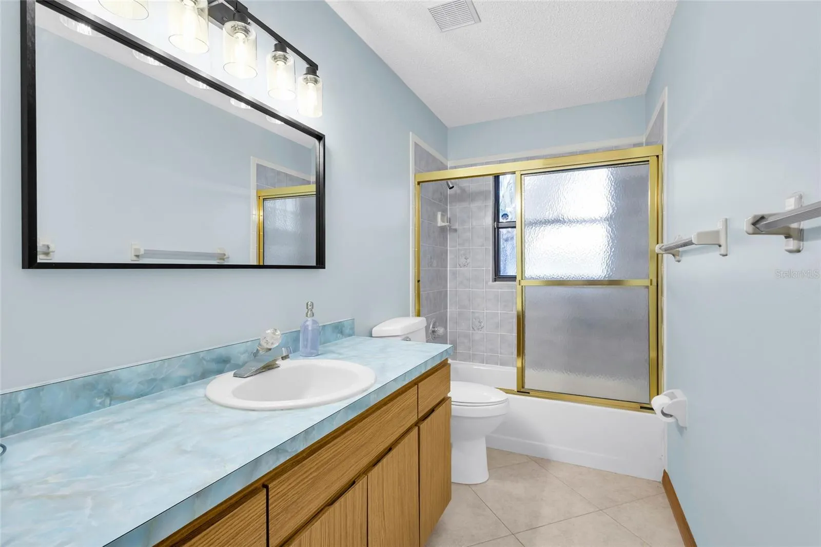 Bathroom #3 with new mirror and lighting