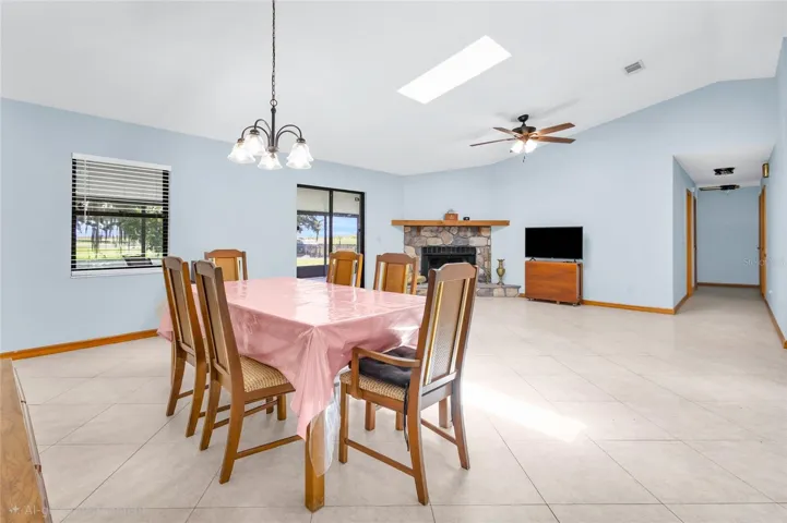 Dining area with vaulted ceilings