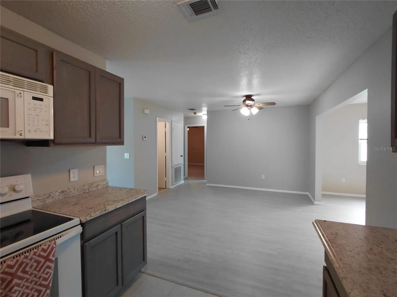 Hallway View to Additional Bedrooms and baths.