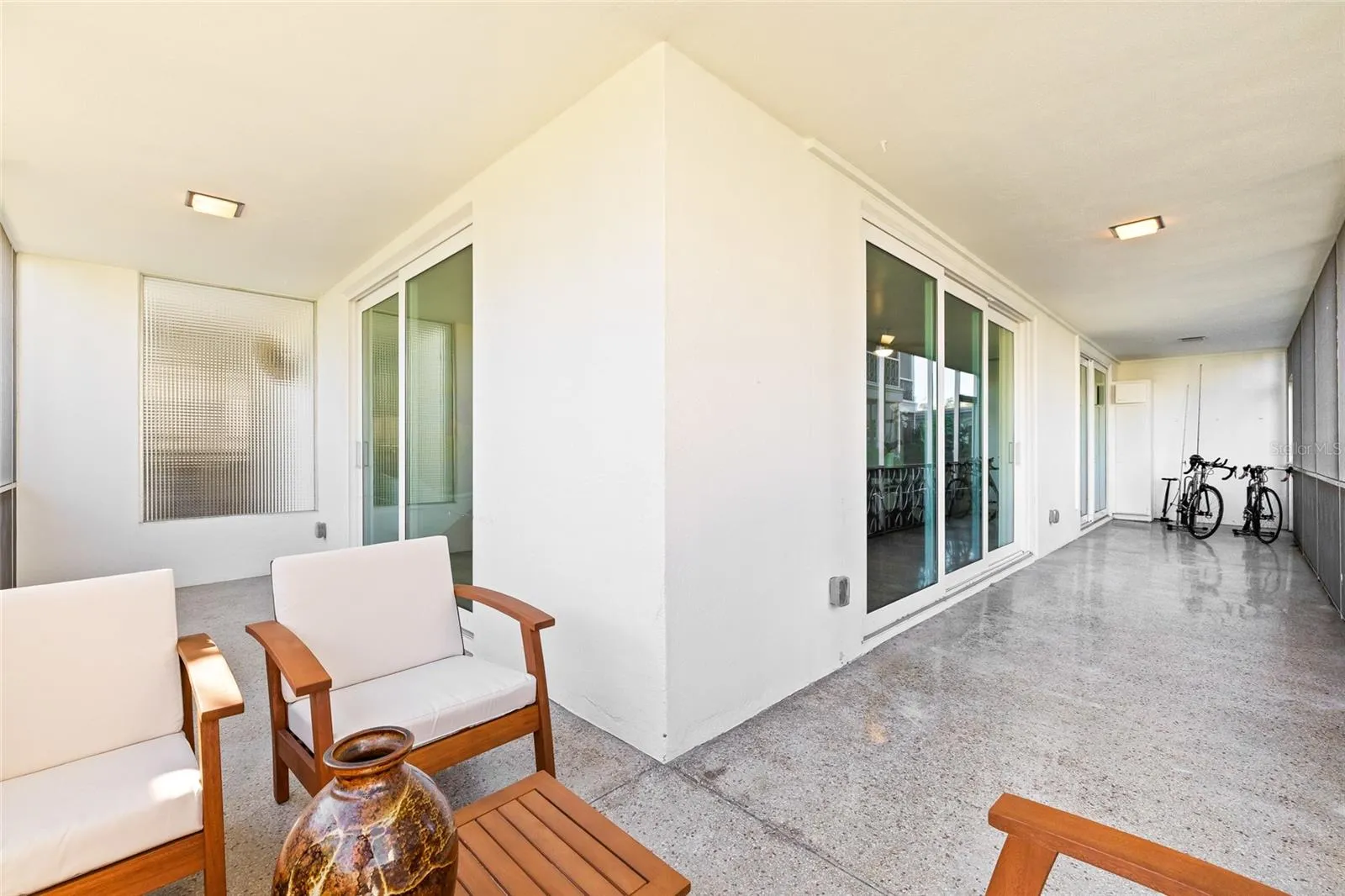 Large wrap-around screened-in patio.