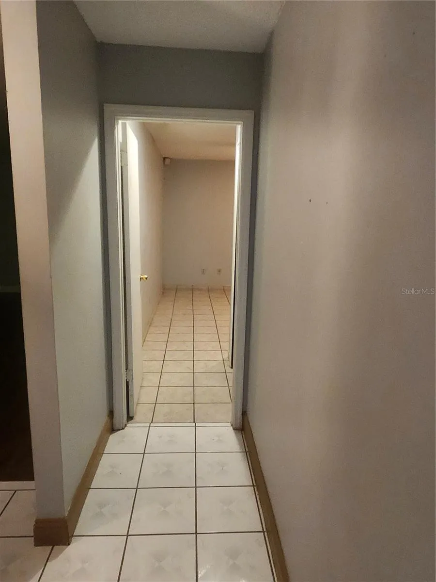 HALLWAY TO PRIMARY BEDROOM