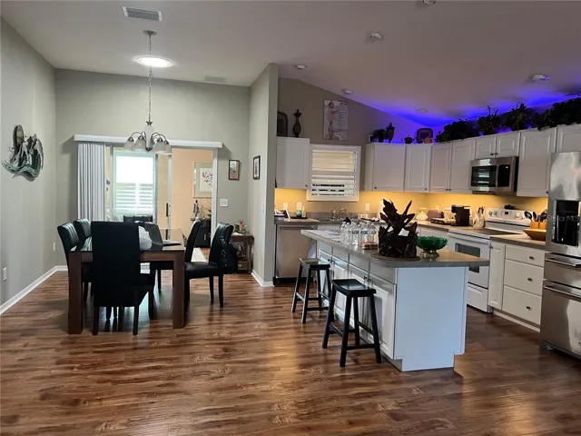 Dining/Kitchen Combo leading out to Bonus Area