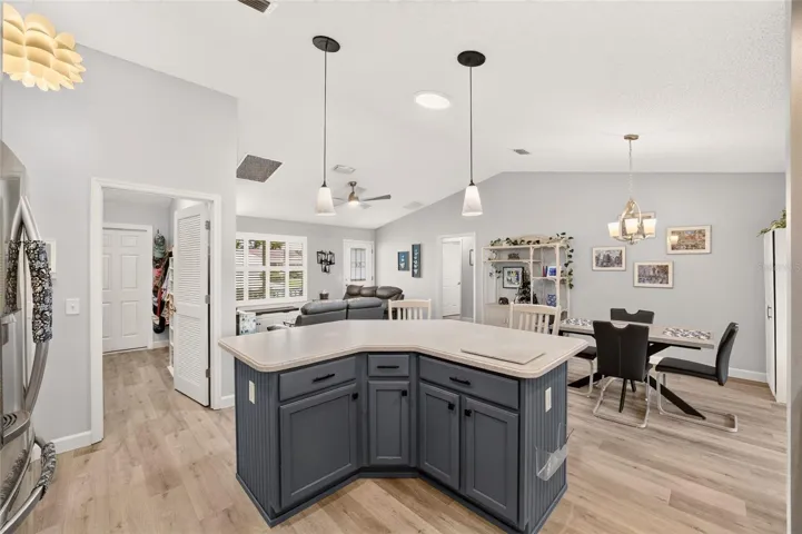 Kitchen looking into living and dining area