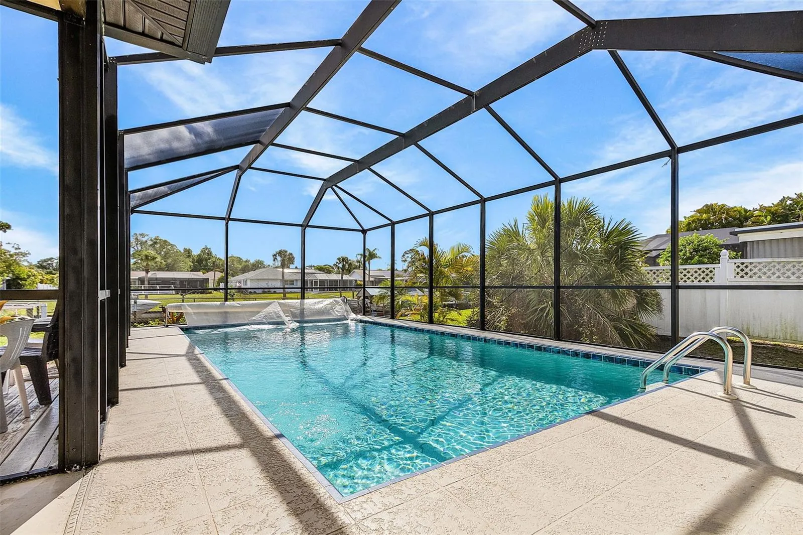 Additional view of the private screened pool and outdoor living area.