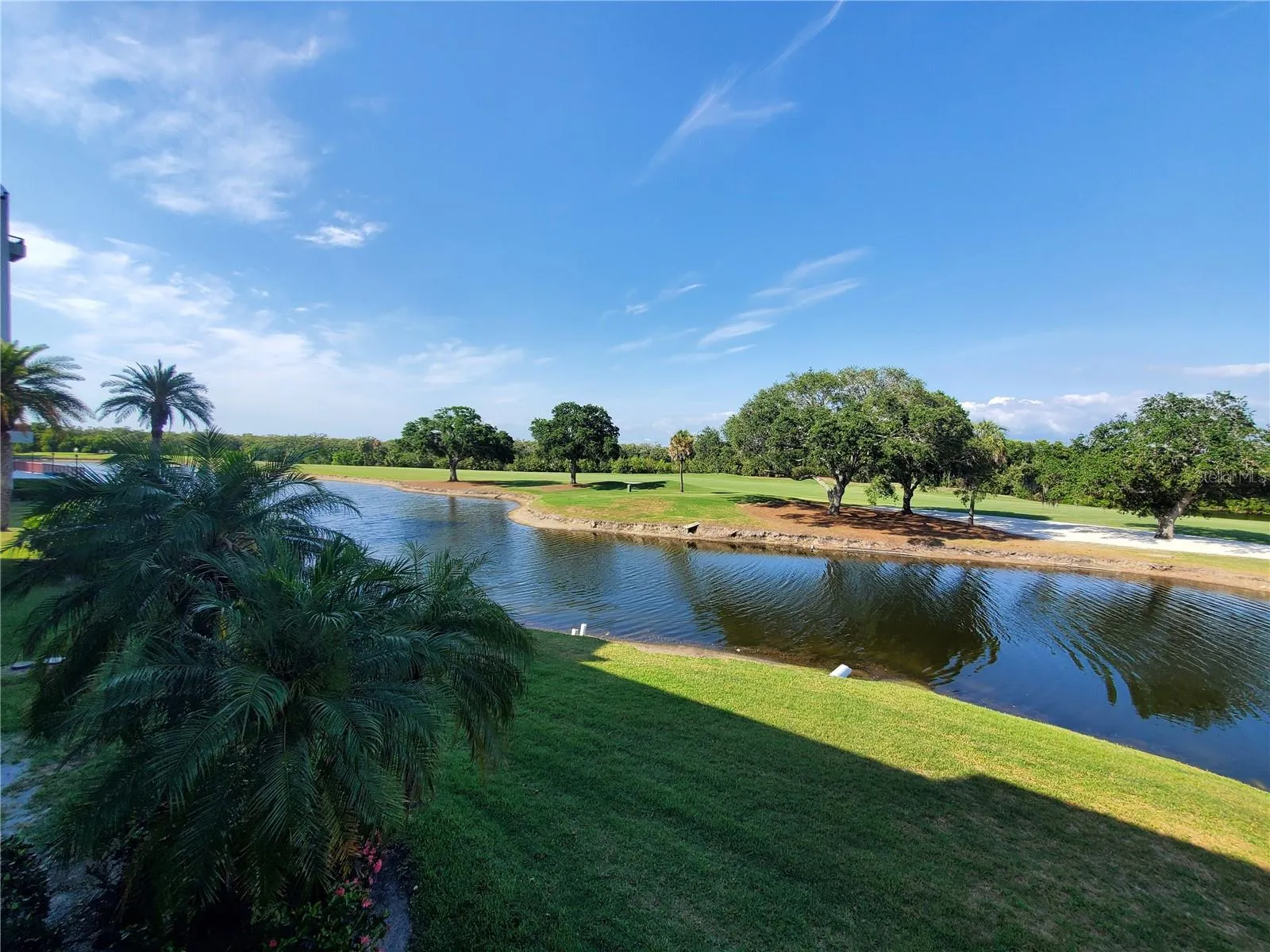 Exterior Back Golf Course and Pond View