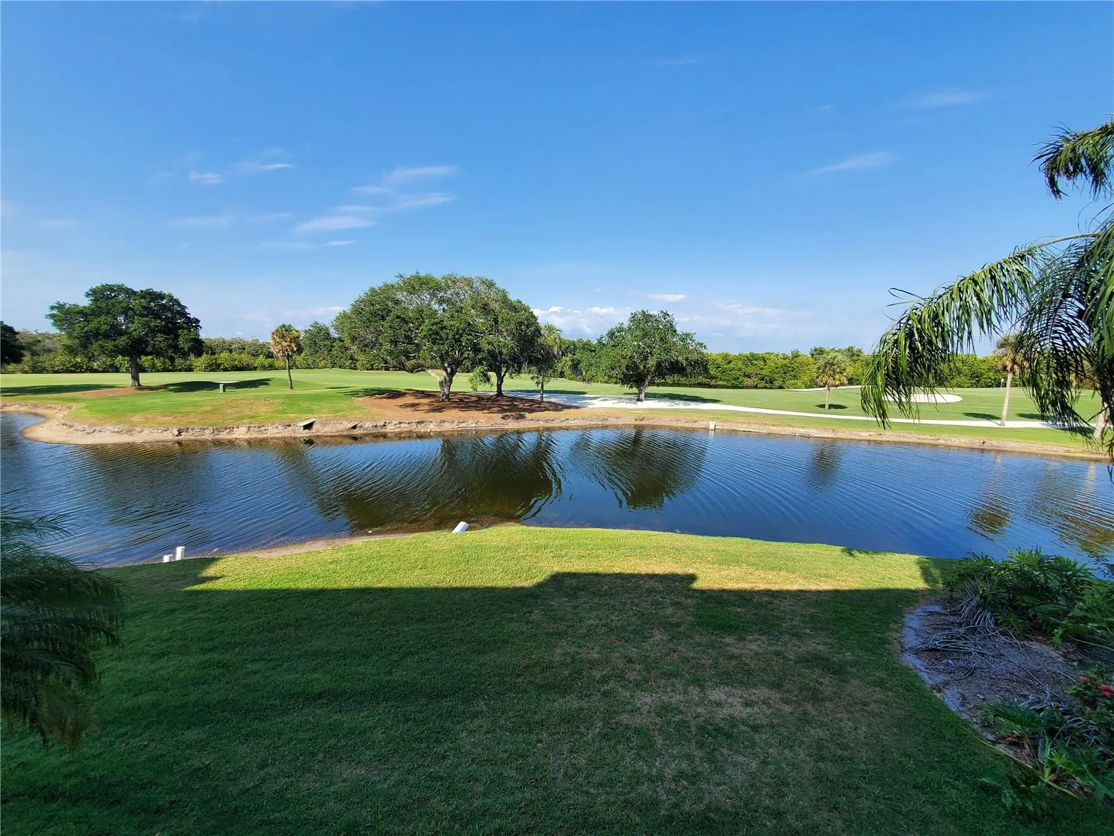 Exterior Back Golf Course and Pond View