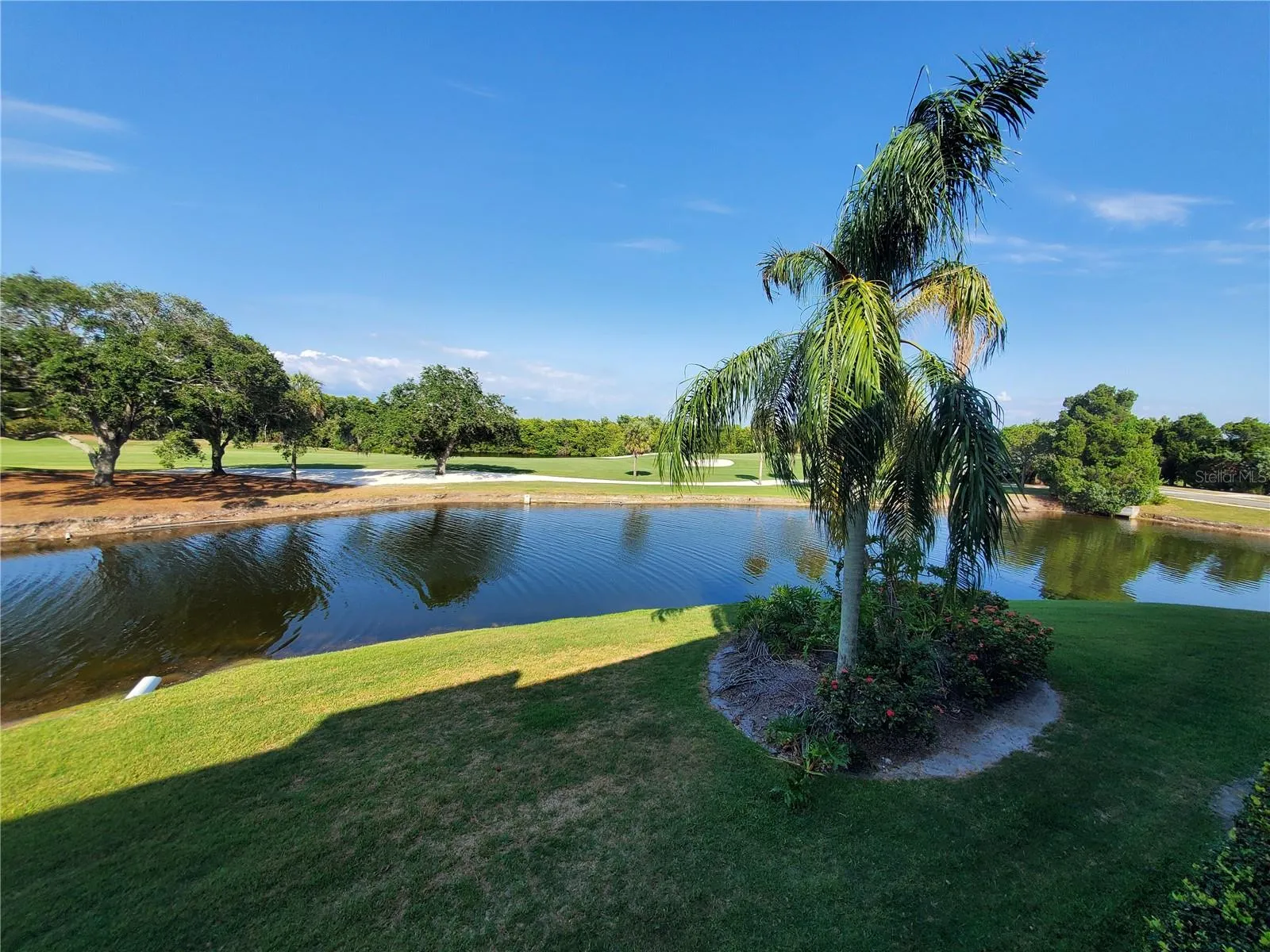 Exterior Back Golf Course and Pond View
