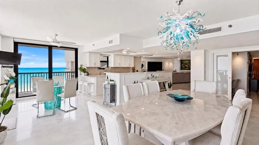 Rare Crystallo Quartzite tabletop provides an exotic touch to the dining area.