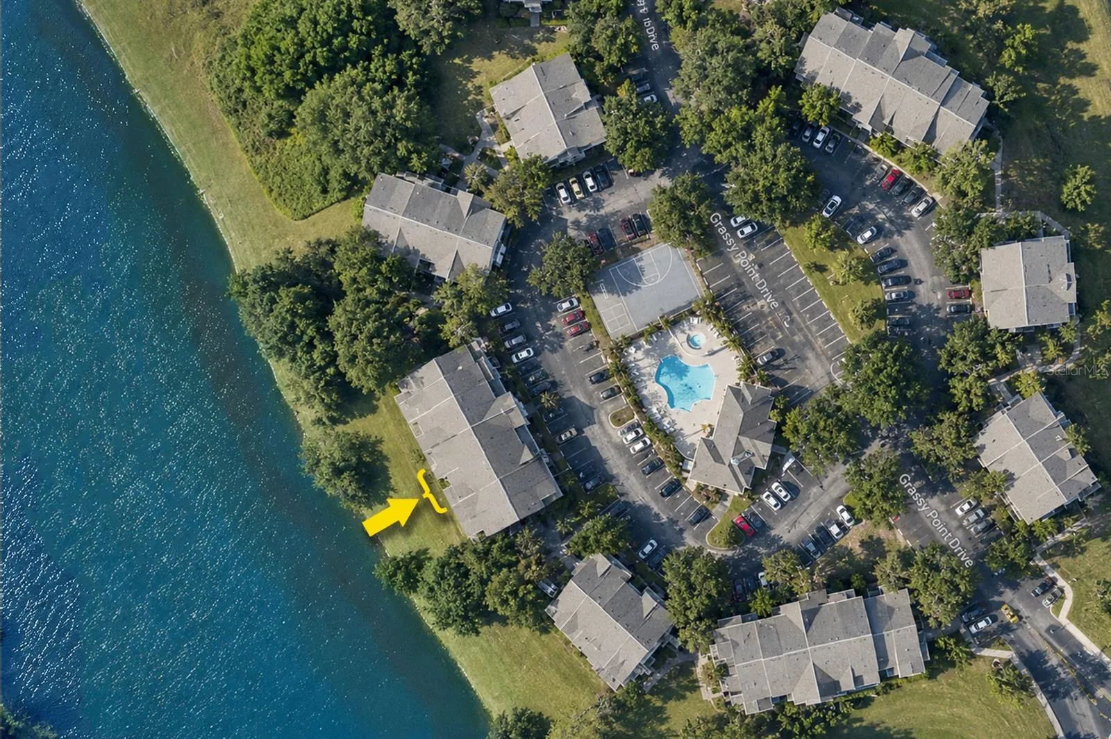 Good-Looking and Affordable, Third-Floor LAKERONT One-Bedroom, One-Bath Condo in a Building Right on the WATER in a RESORT COMMUNITY!  HOLY COW!