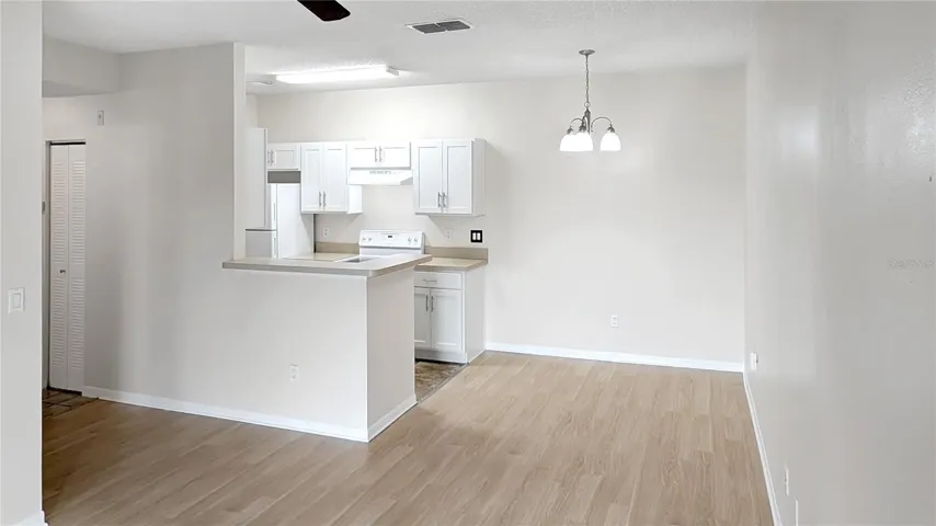 Kitchen and Dining Room as seen from Living Room and Porch Entrance!
