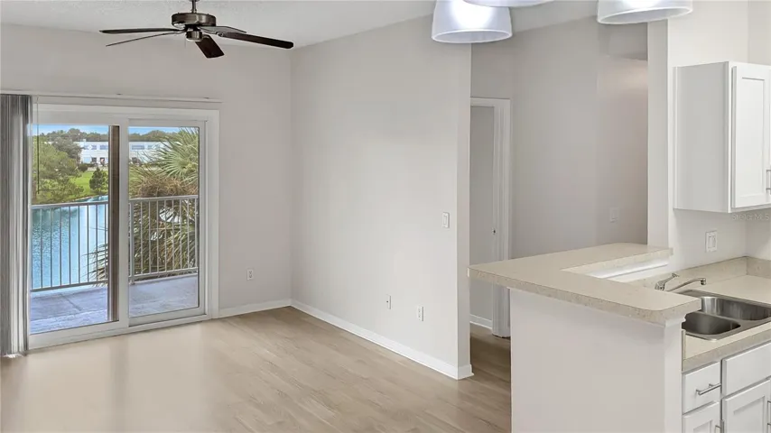 Living Room &amp; Kitchen as seen from Dining Room!  •Brand-New PAINT inside means the home even Smells New! Nice!