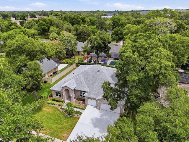 Welcome home to 119 Winding Oaks located in highly sought after Whispering Woods neighborhood in the heart of Oviedo