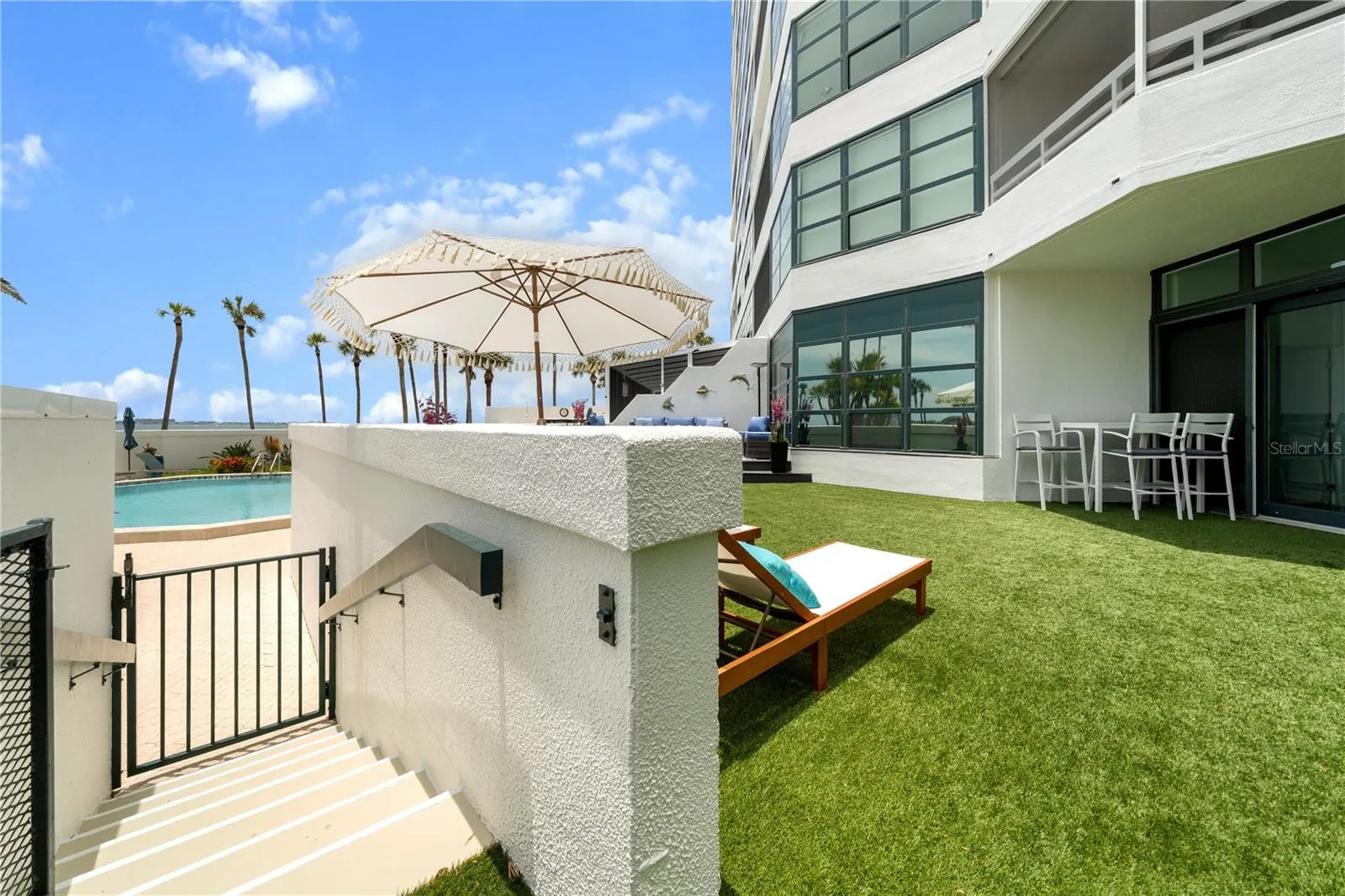 PRIVATE GATE DOWN TO AMENITIES...POOL, SAUNA, FITNESS, MARINA...