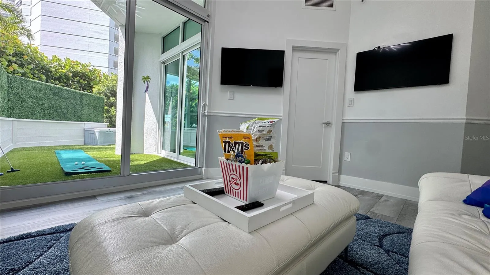MEDIA ROOM DOUBLES AS A THIRD BEDROOM WITH A LARGE WALK-IN CLOSET