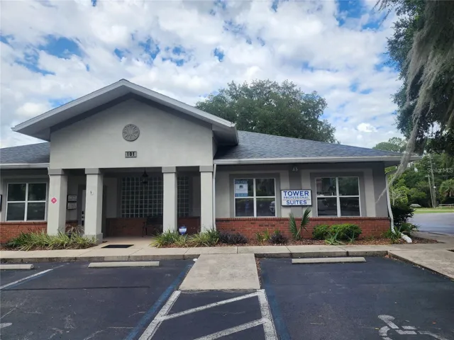Building located on Tower Road at intersection of West University Ave (which goes behind Home Depot)