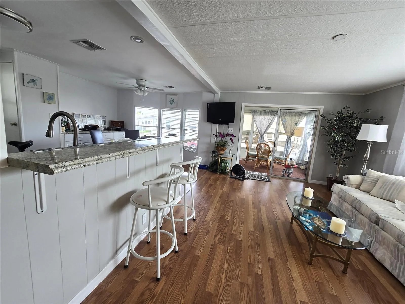 From living room towards front enclosed porch