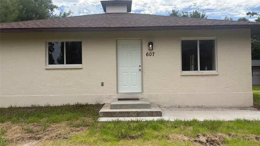 View front door of home.