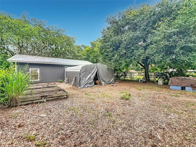 4 car garage and exterior carport