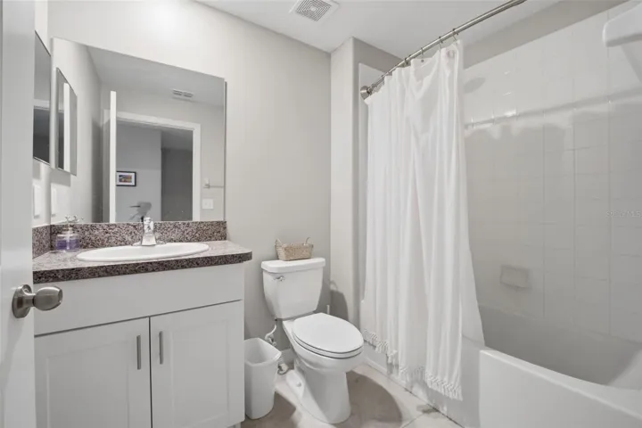 Hall bathroom with tub/shower combo
