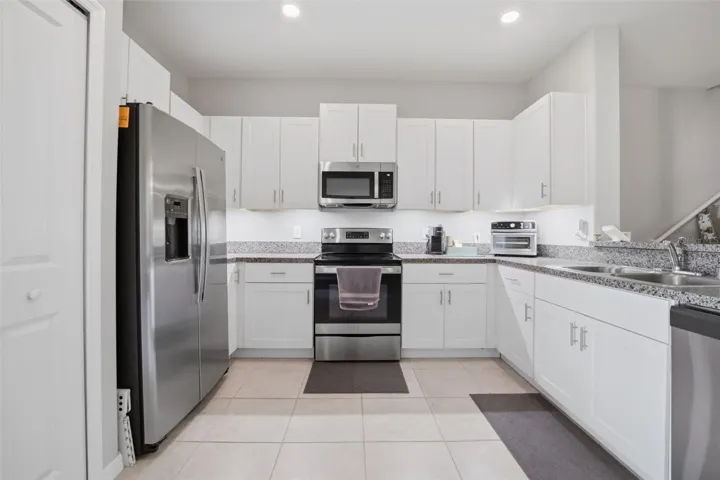 Functional kitchen with stainless appliances