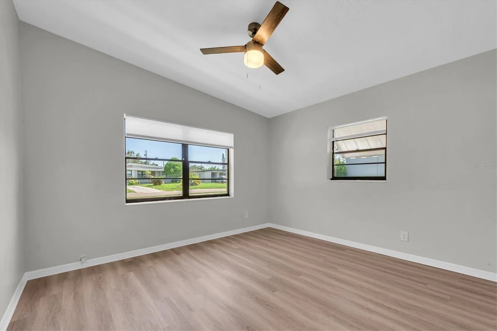 Both bedrooms have vaulted ceilings