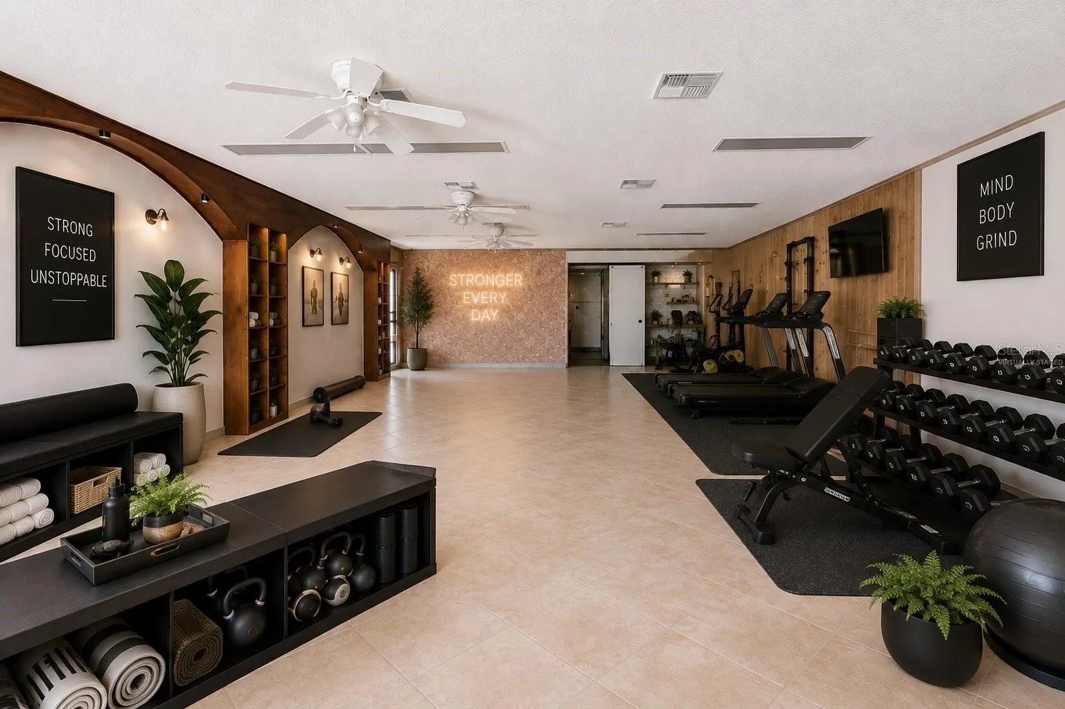 Entry View Virtually Staged as a gym