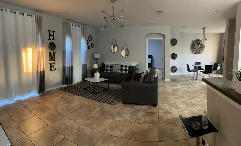 open floor plan dining room family room staged