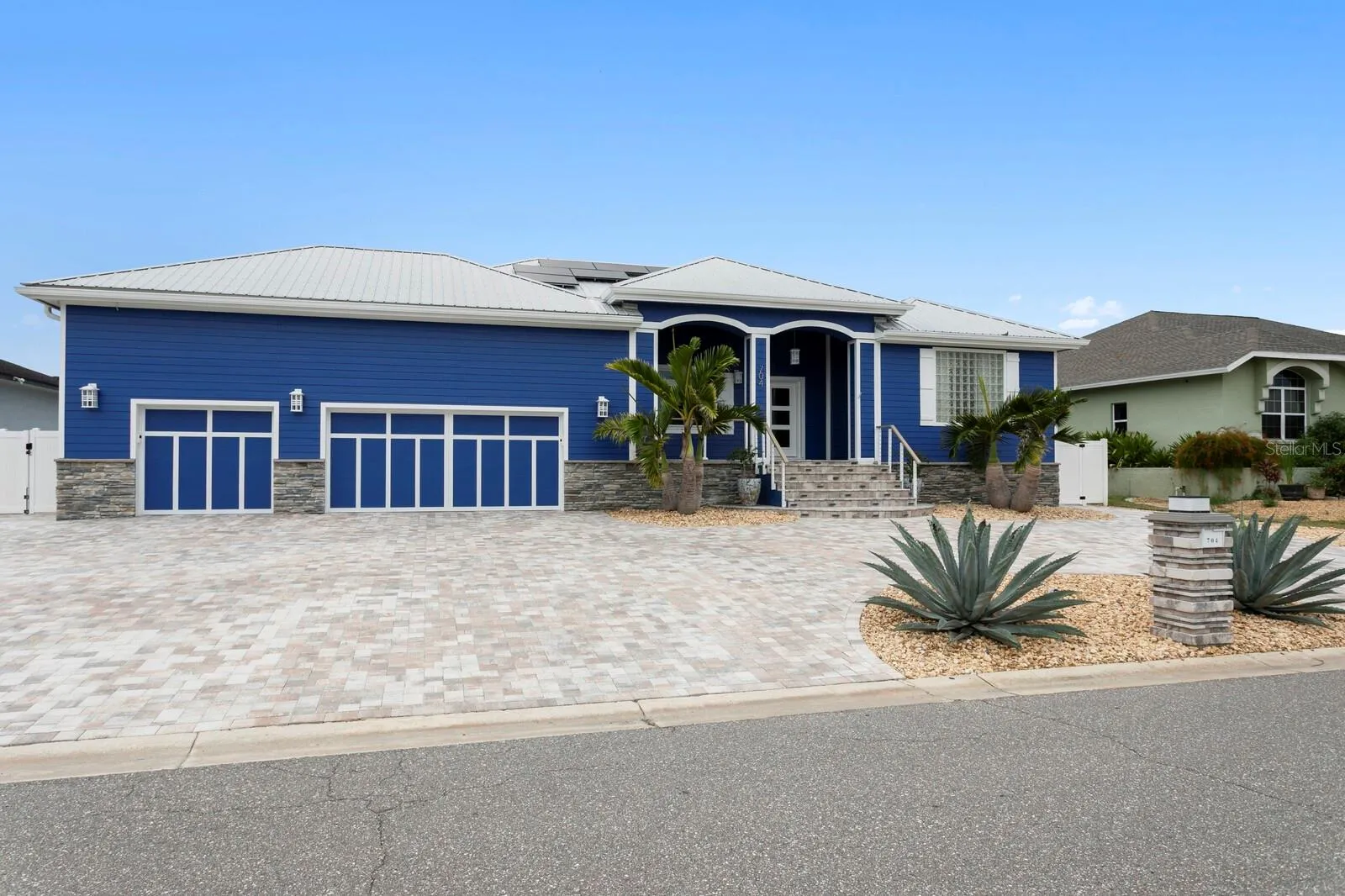 Beautiful hand-laid paver circular drive