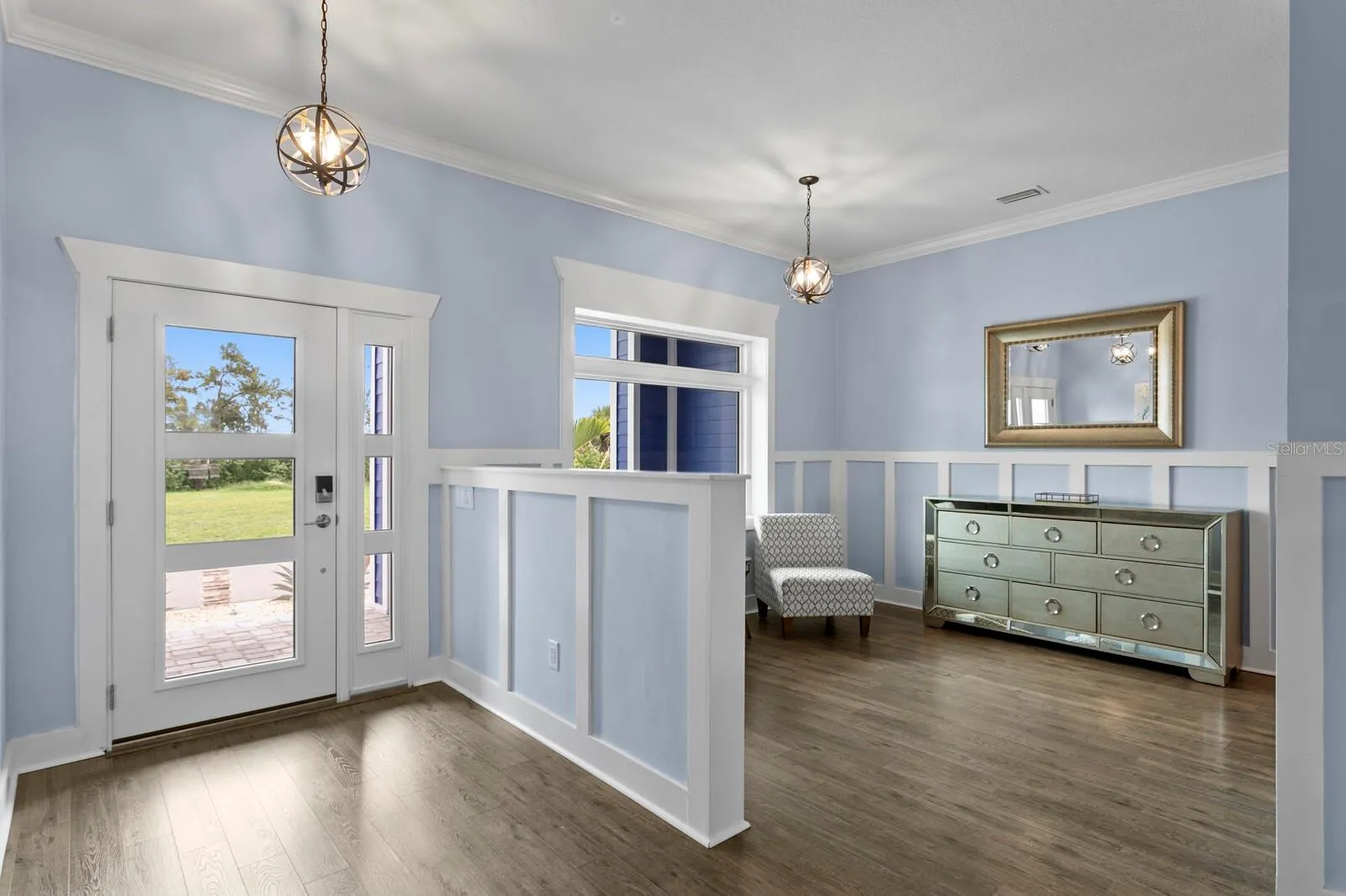 Enter through the Foyer opening to formal Living Room