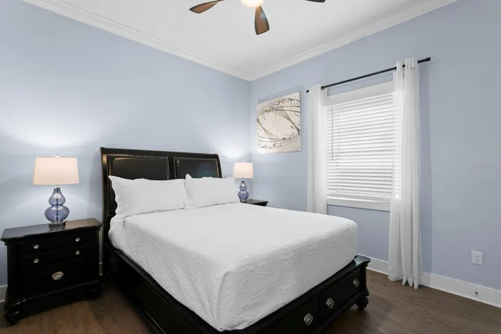 Bedroom 3 with crown molding and ceiling fan