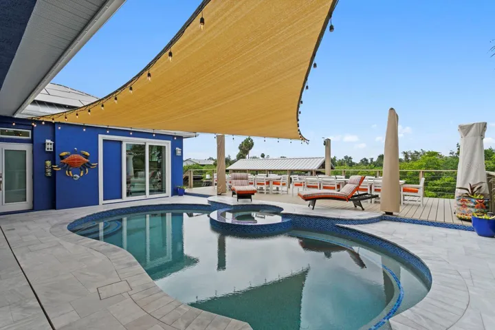 Redesigned pool features a wrap-around bench