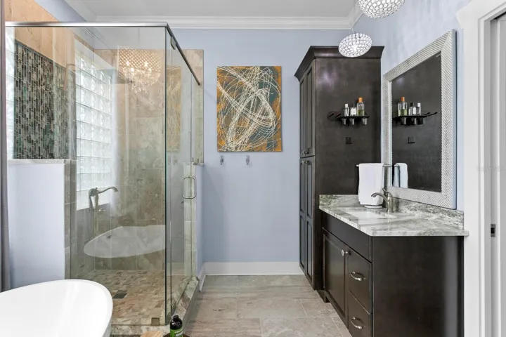 Tile shower with glass tile accent wall