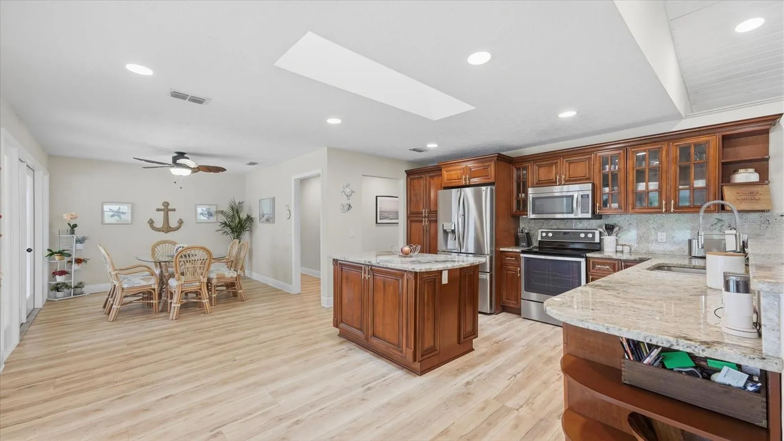 Centrally located kitchen with spacious dining area