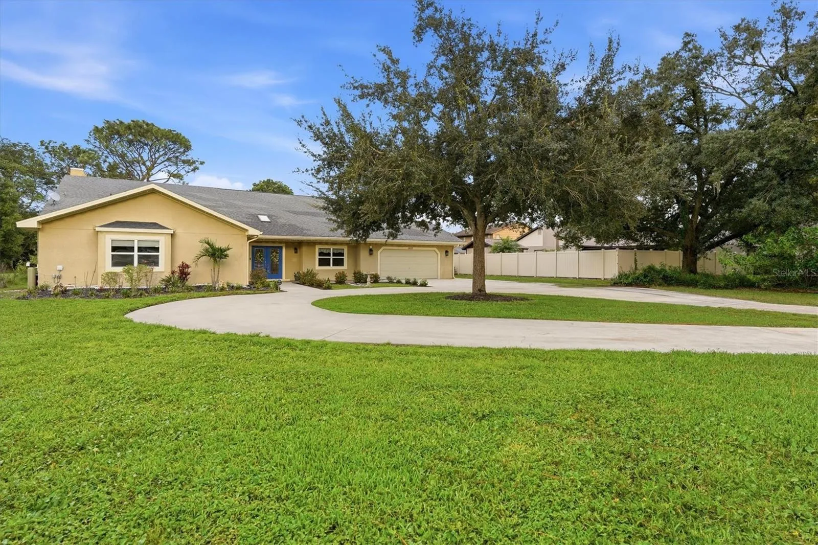 Beautiful curb appeal and inviting double door entry with glass inlay.