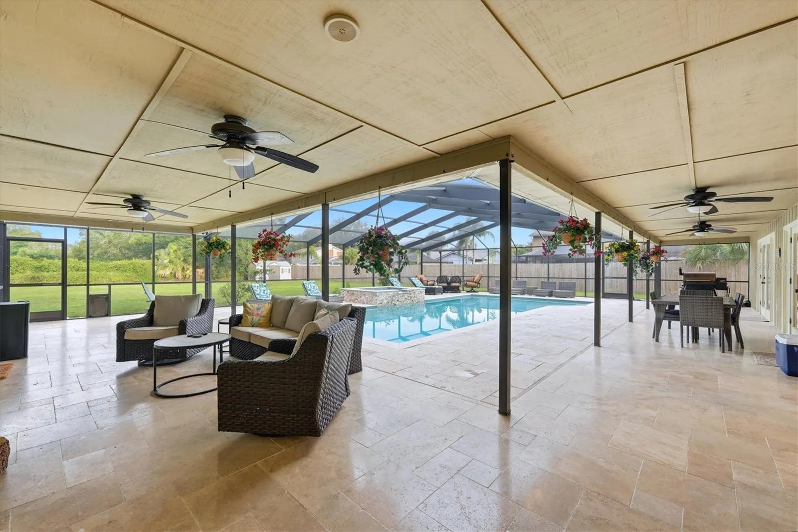 Look at all that space!  Several covered areas are great for relaxing, dining or simply taking a break from the sun!