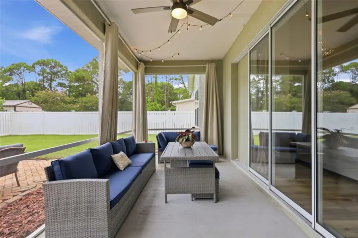 Large screened in the huge, vinyl fenced backyard.